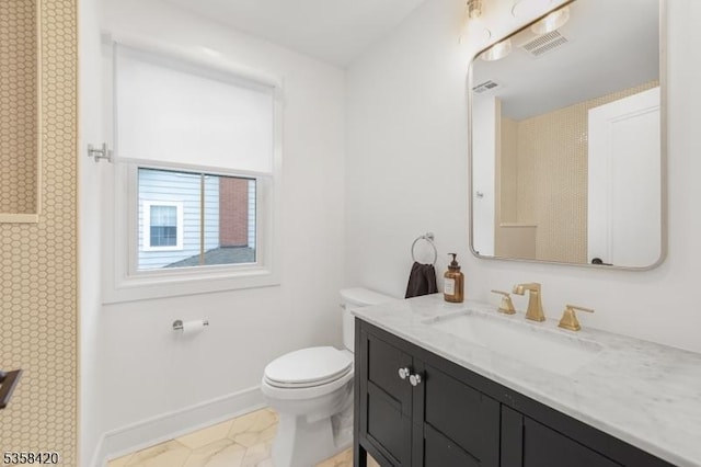 full bathroom with toilet, baseboards, and vanity