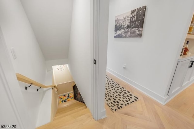 stairway with baseboards