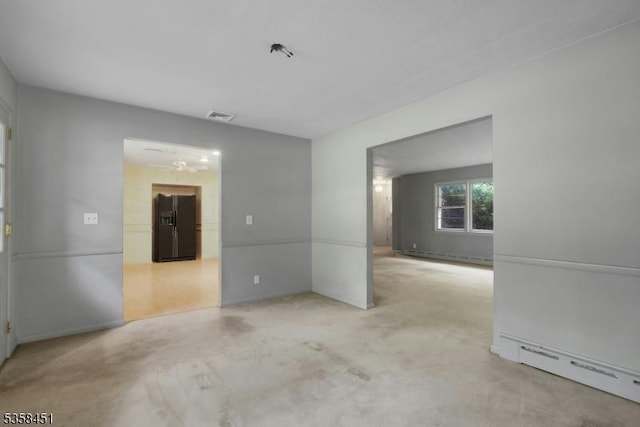 64 Old Smalleytown Rd, Warren Twp, NJ 07059 - unfurnished room with baseboard heating, a baseboard heating unit, and ceiling fan