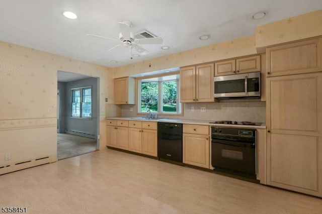 64 Old Smalleytown Rd, Warren Twp, NJ 07059 - kitchen with black appliances, light brown cabinets, a baseboard radiator, light countertops, and recessed lighting