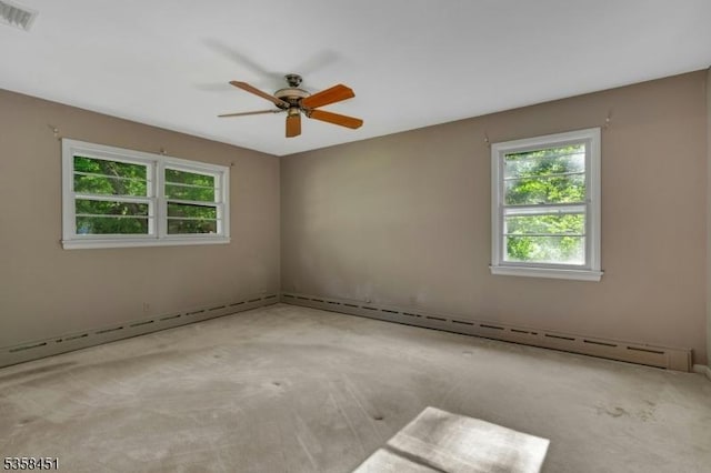 64 Old Smalleytown Rd, Warren Twp, NJ 07059 - spare room with carpet, a ceiling fan, and a baseboard radiator