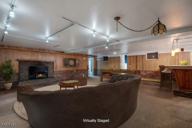 64 Old Smalleytown Rd, Warren Twp, NJ 07059 - carpeted living room with rail lighting and wooden walls