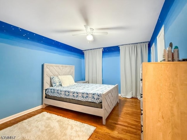 24 Hutton Ave Unit 75, West Orange Twp, NJ 07052 - bedroom featuring wood finished floors, baseboards, and a ceiling fan