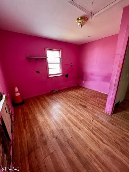 80 Seeley Ave, Keansburg Boro, NJ 07734 - spare room with attic access and wood finished floors