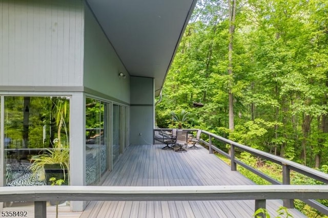 1178 Johnston Dr, Watchung Boro, NJ 07069 - deck with outdoor dining space and a forest view