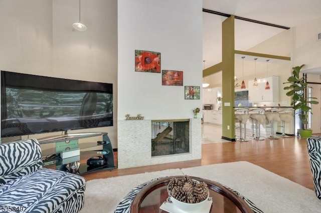 1178 Johnston Dr, Watchung Boro, NJ 07069 - living area with high vaulted ceiling and wood finished floors