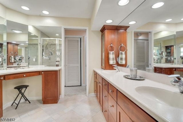 1178 Johnston Dr, Watchung Boro, NJ 07069 - bathroom featuring a closet, a stall shower, baseboards, double vanity, and recessed lighting