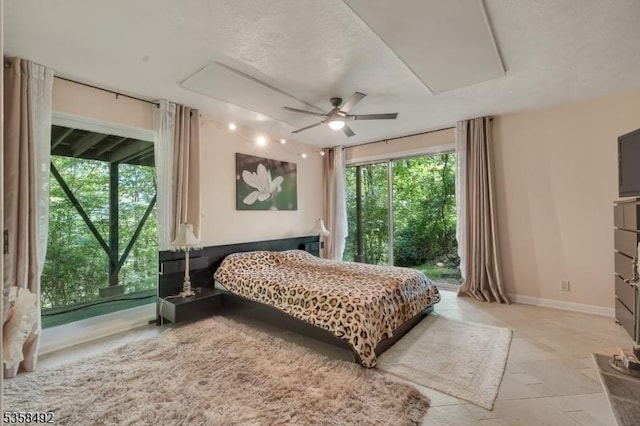 1178 Johnston Dr, Watchung Boro, NJ 07069 - bedroom with access to outside, baseboards, ceiling fan, and stone tile flooring