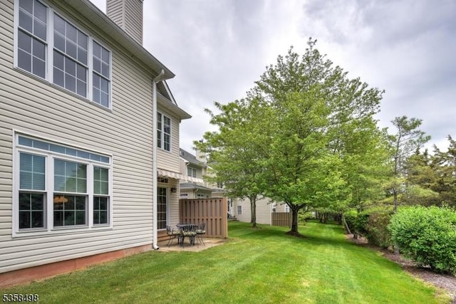 4 Loft Dr, Bridgewater Twp, NJ 08836 - view of grassy yard with a patio area