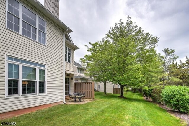 4 Loft Dr, Bridgewater Twp, NJ 08836 - view of grassy yard with a patio area