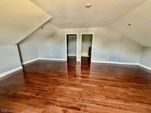 1552 Elaine Ter, Union Twp, NJ 07083 - additional living space featuring wood finished floors, vaulted ceiling, and baseboards