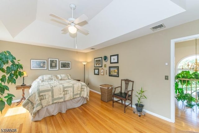 2 Jolie Ct, Boonton Town, NJ 07005 - bedroom featuring wood finished floors, a raised ceiling, baseboards, and a ceiling fan