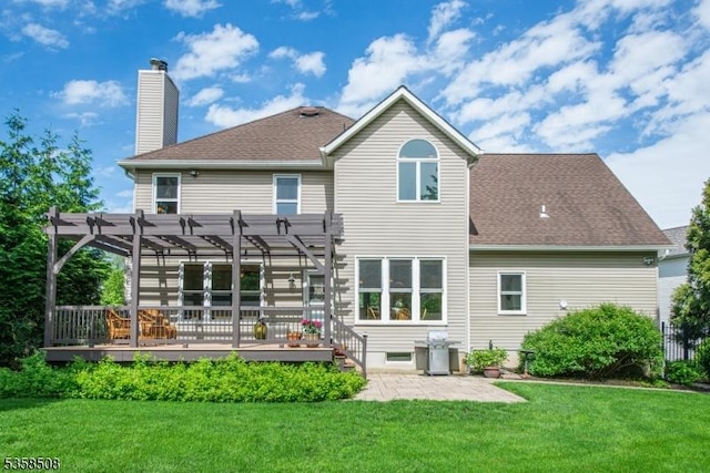 2 Jolie Ct, Boonton Town, NJ 07005 - rear view of house featuring a pergola, a deck, a yard, and a chimney