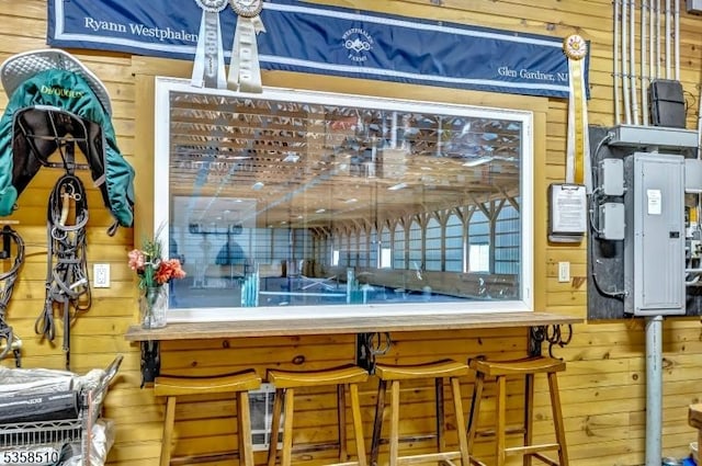 detailed view of wooden walls and electric panel