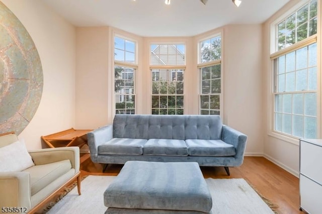 618 Turlington Ct, Livingston Twp, NJ 07039 - living area featuring wood finished floors and baseboards