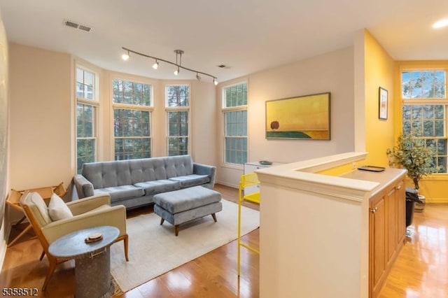 618 Turlington Ct, Livingston Twp, NJ 07039 - living room with light wood-style flooring