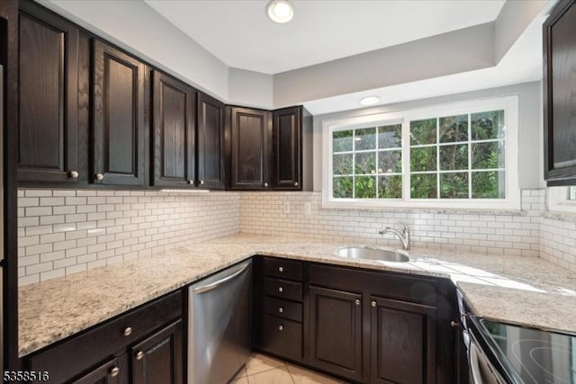 24 Stevens Ct, Bedminster Twp, NJ 07921 - kitchen featuring stainless steel dishwasher, dark brown cabinets, light stone countertops, tasteful backsplash, and a sink