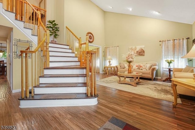 40 Nathan Dr, Old Bridge Twp, NJ 08857 - staircase featuring high vaulted ceiling, wood finished floors, plenty of natural light, and baseboards