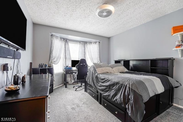 40 Nathan Dr, Old Bridge Twp, NJ 08857 - bedroom with carpet floors, an office area, a textured ceiling, and baseboards