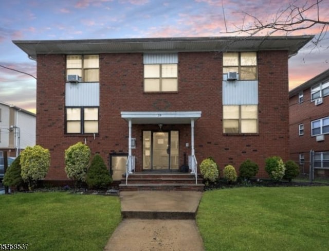 35 E Price St Unit 5, Linden City, NJ 07036 - view of front of home featuring brick siding and a front lawn