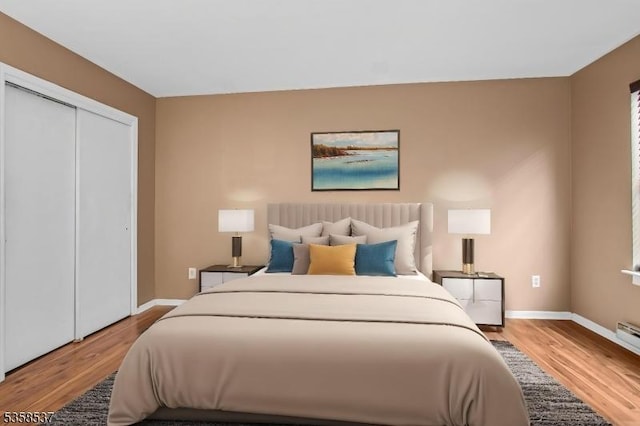 35 E Price St Unit 5, Linden City, NJ 07036 - bedroom with wood finished floors, a closet, and baseboards