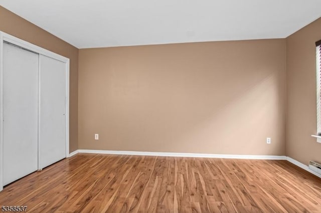 35 E Price St Unit 5, Linden City, NJ 07036 - unfurnished bedroom featuring light wood-type flooring, baseboards, and a closet
