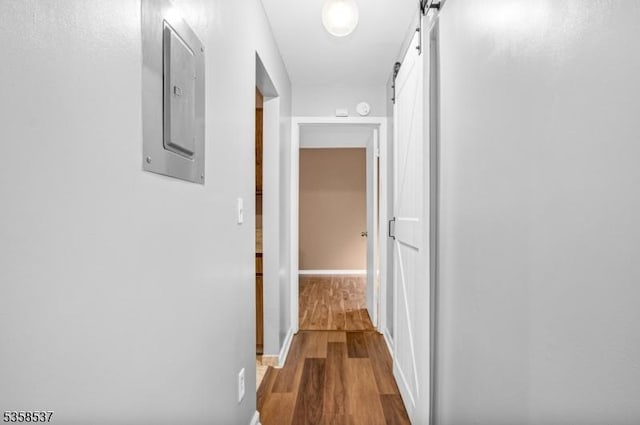 35 E Price St Unit 5, Linden City, NJ 07036 - corridor with a barn door, wood finished floors, electric panel, and baseboards