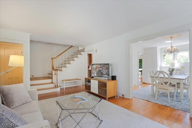22 Bailey Rd, Millburn Twp, NJ 07041 - living area with stairs, a chandelier, and wood finished floors