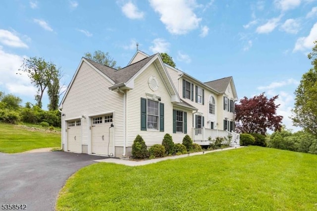 104 Hockenbury Dr, Glen Gardner Boro, NJ 08826 - view of side of home with a lawn, driveway, and a garage