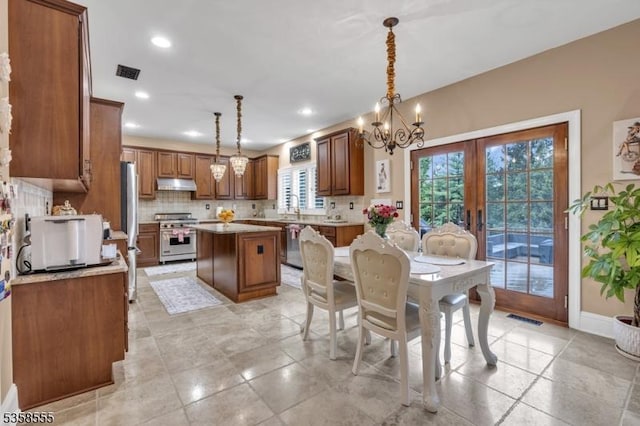 7 Montaine Pl, Clinton Twp, NJ 08833 - dining area with a chandelier, recessed lighting, french doors, and baseboards