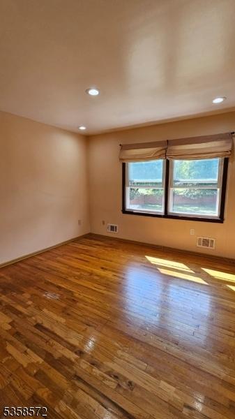 118 Prospect St, Franklin Twp, NJ 08873 - spare room with wood-type flooring and recessed lighting