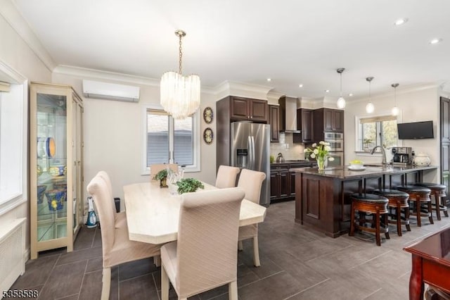 dining room with a wall unit AC, a chandelier, recessed lighting, radiator heating unit, and ornamental molding