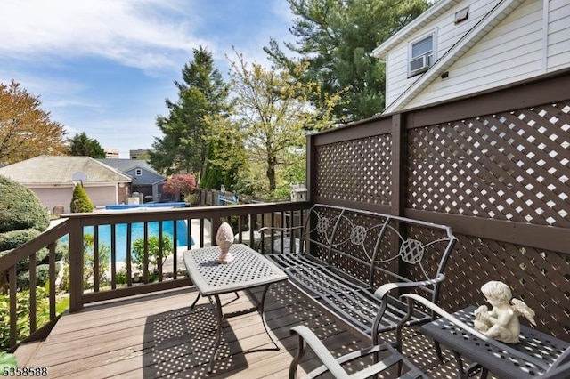 deck featuring outdoor dining area