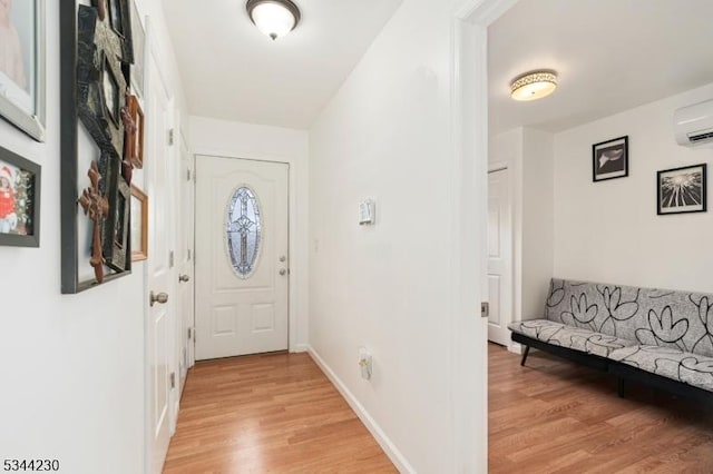 620 Hemlock Rd, Hampton Twp, NJ 07860 - doorway featuring light wood-style flooring and a wall unit AC
