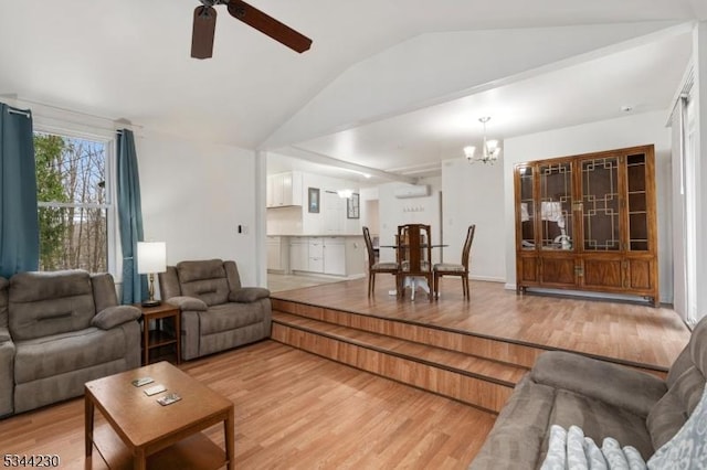 620 Hemlock Rd, Hampton Twp, NJ 07860 - living area featuring lofted ceiling, a chandelier, ceiling fan, light wood-style flooring, and an AC wall unit