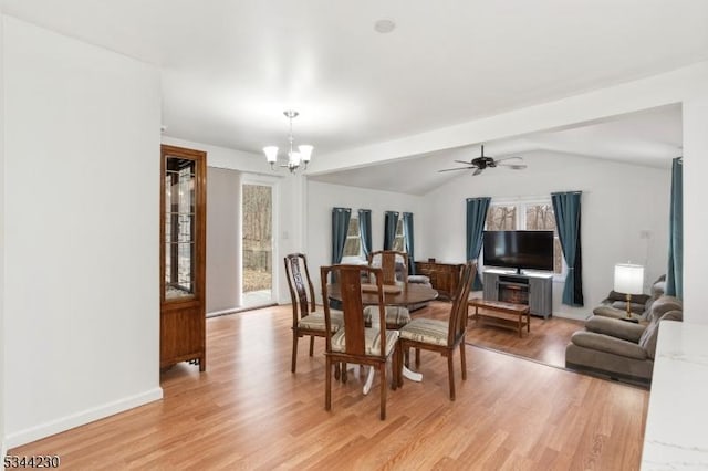 620 Hemlock Rd, Hampton Twp, NJ 07860 - dining room with a chandelier, healthy amount of natural light, light wood-type flooring, vaulted ceiling, and baseboards