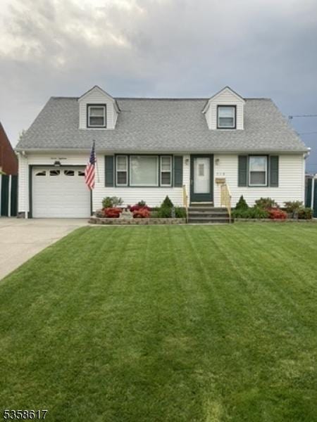 718 Pine St, Roselle Park Boro, NJ 07204 - new england style home with driveway, a garage, a front lawn, and a shingled roof