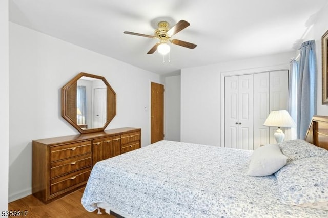 718 Pine St, Roselle Park Boro, NJ 07204 - bedroom featuring wood finished floors, a closet, and a ceiling fan