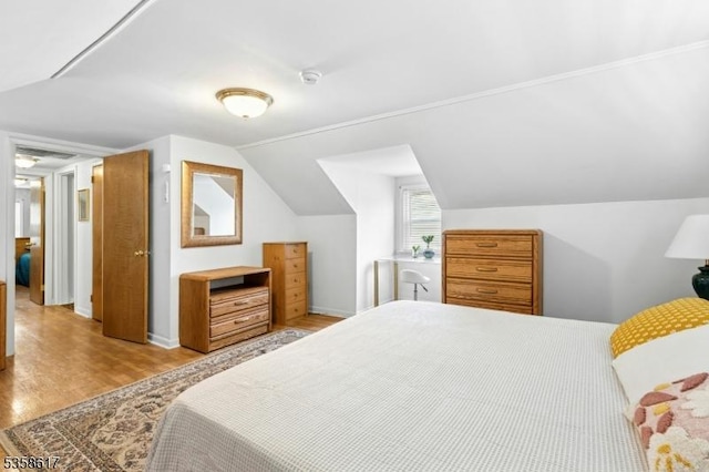 718 Pine St, Roselle Park Boro, NJ 07204 - bedroom featuring wood finished floors and vaulted ceiling