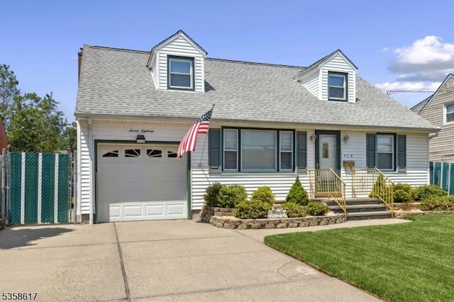 718 Pine St, Roselle Park Boro, NJ 07204 - new england style home featuring concrete driveway and a shingled roof