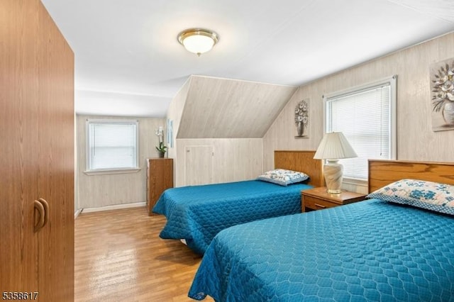 718 Pine St, Roselle Park Boro, NJ 07204 - bedroom with wood finished floors and lofted ceiling