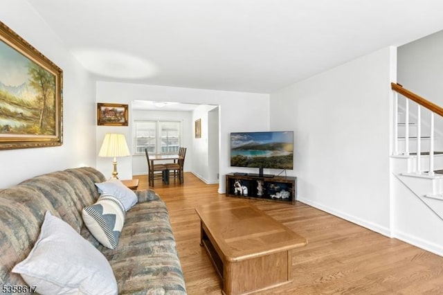 718 Pine St, Roselle Park Boro, NJ 07204 - living area featuring stairway and wood finished floors