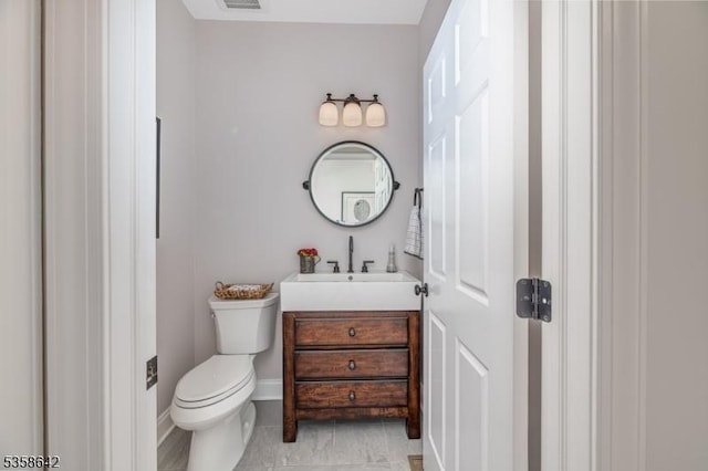 11 Brookside Dr, Peapack Gladstone Boro, NJ 07934 - bathroom featuring vanity, toilet, tile patterned floors, and baseboards