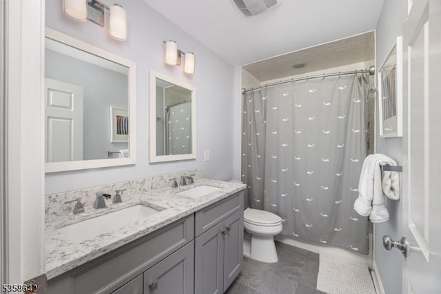 11 Brookside Dr, Peapack Gladstone Boro, NJ 07934 - full bath featuring toilet, double vanity, a shower with shower curtain, and tile patterned floors