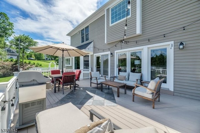 11 Brookside Dr, Peapack Gladstone Boro, NJ 07934 - wooden deck with an outdoor hangout area and outdoor dining space