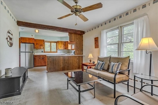 18 Pottersville Rd, Peapack Gladstone Boro, NJ 07934 - living area with ceiling fan, light wood finished floors, and beamed ceiling