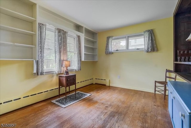 18 Pottersville Rd, Peapack Gladstone Boro, NJ 07934 - unfurnished room featuring wood finished floors and a baseboard heating unit
