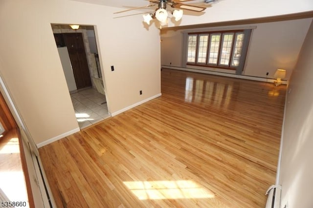 293 Oak Ridge Rd, Clark Twp, NJ 07066 - empty room featuring a ceiling fan, light wood finished floors, and baseboards