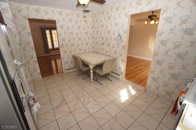 293 Oak Ridge Rd, Clark Twp, NJ 07066 - dining space with a ceiling fan, a baseboard radiator, wallpapered walls, and baseboards