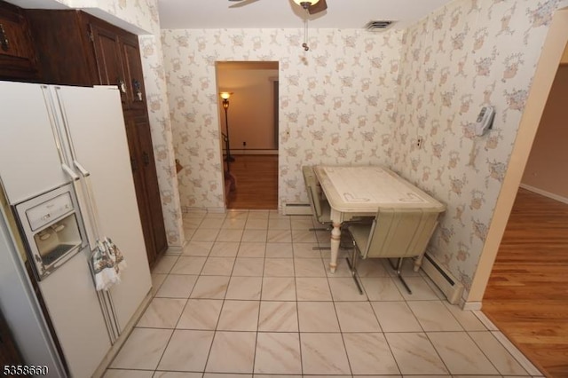 293 Oak Ridge Rd, Clark Twp, NJ 07066 - dining space with wallpapered walls, baseboards, a ceiling fan, light tile patterned floors, and baseboard heating